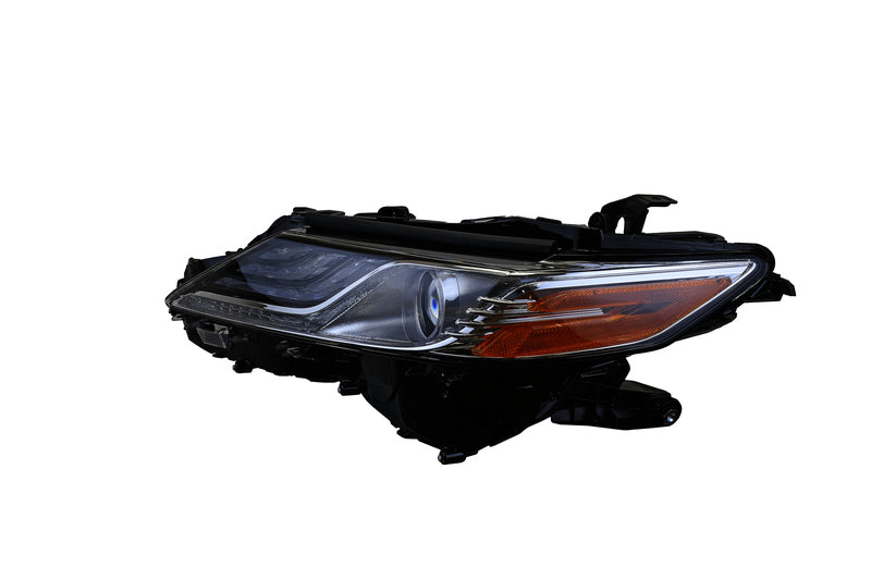 HELLA Headlight Assembly - 354888051