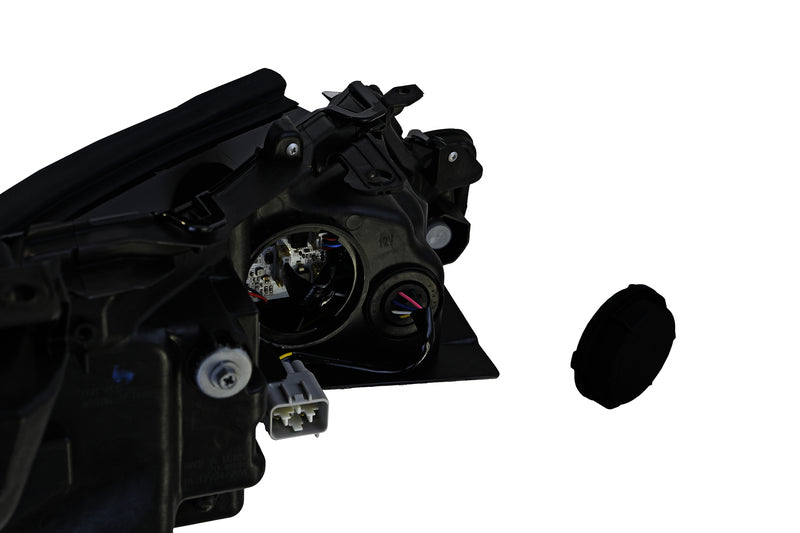 HELLA Headlight Assembly - 354888071