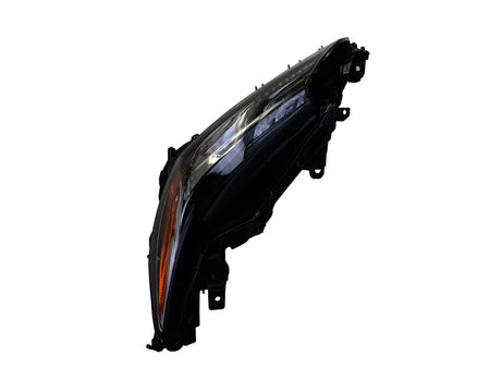 HELLA Headlight Assembly - 354888071