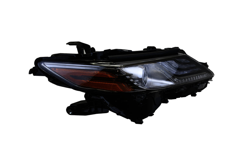 HELLA Headlight Assembly - 354888081