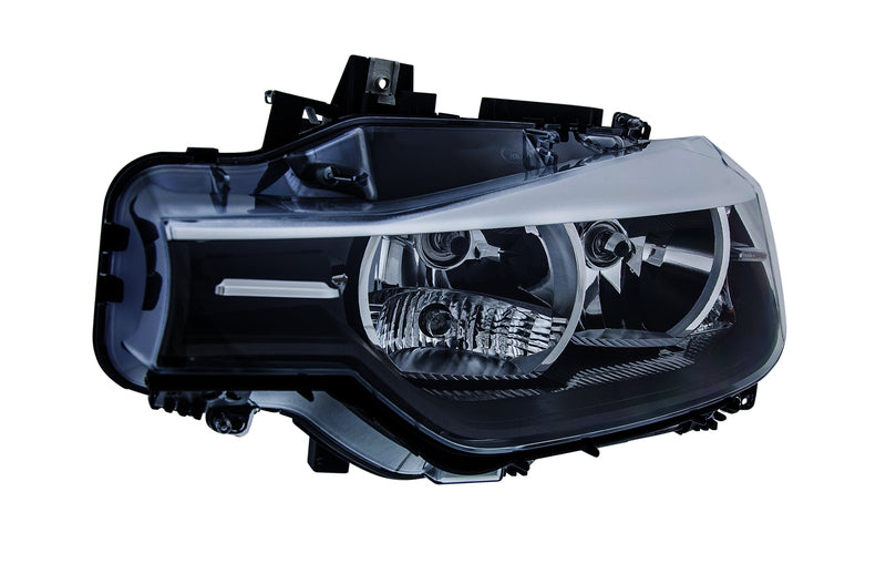 HELLA Headlight Assembly - 354983051