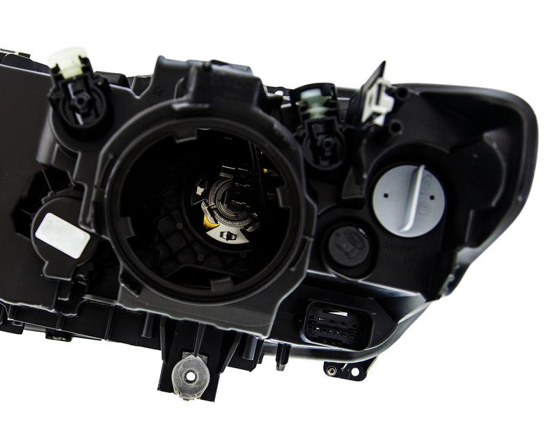 HELLA Headlight Assembly - 354983051