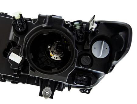HELLA Headlight Assembly - 354983051