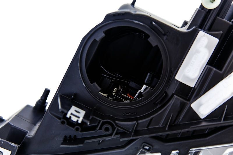 HELLA Headlight Assembly - 354983051