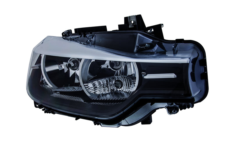 HELLA Headlight Assembly - 354983061
