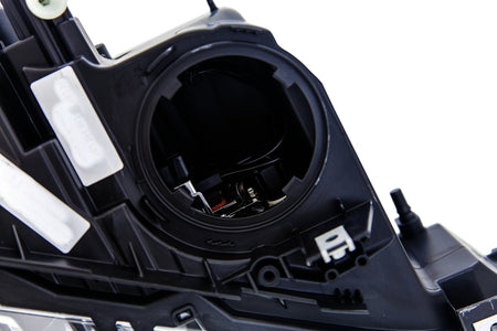 HELLA Headlight Assembly - 354983061