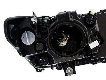 HELLA Headlight Assembly - 354983061