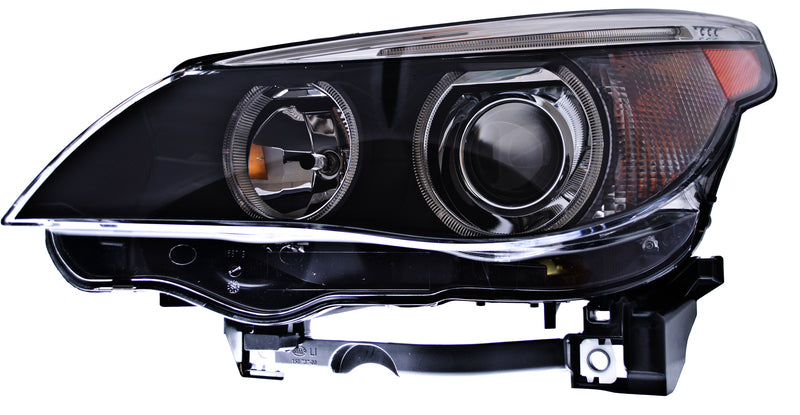 HELLA Headlight Assembly - H11077031